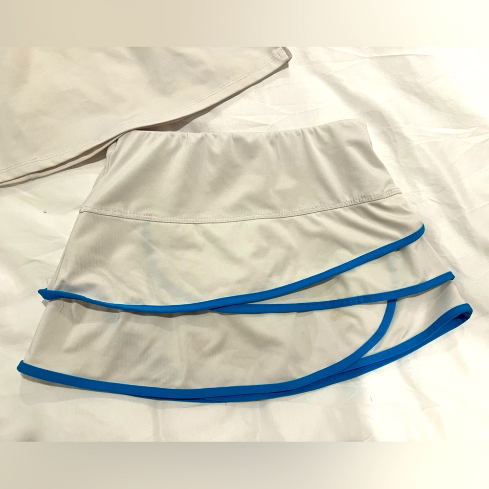 Lucky in Love juniors tennis skirt in white with teal piping
